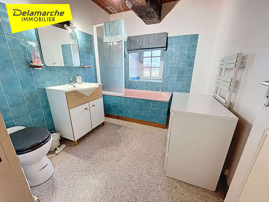 Maison à SAINT-AUBIN-DE-TERREGATTE