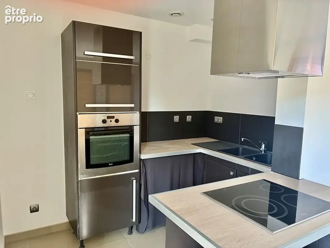 Dans peteit immeuble t2/3 de 43.30m² - photo 2