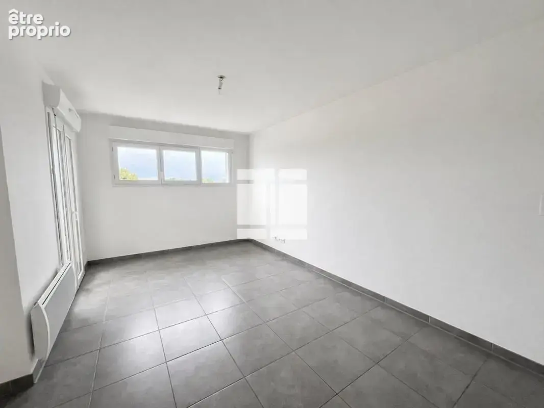 Appartement T2 de 41 m² avec terrasse et parking - photo 5