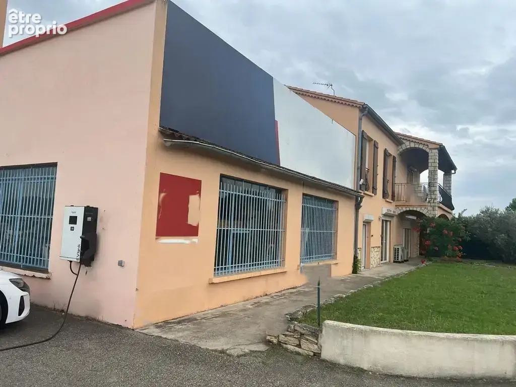 Local commercial + maison - photo 1