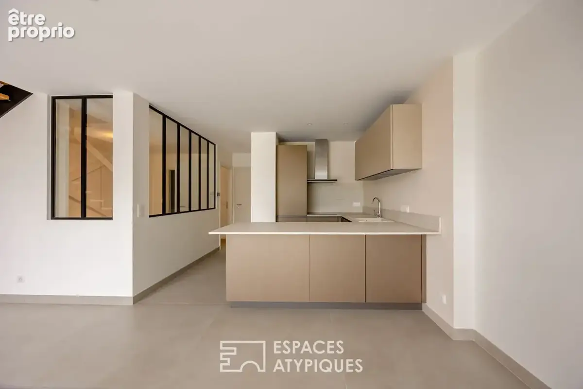 Loft contemporain en duplex et sa terrasse dans une ancienne friche industrielle - photo 3