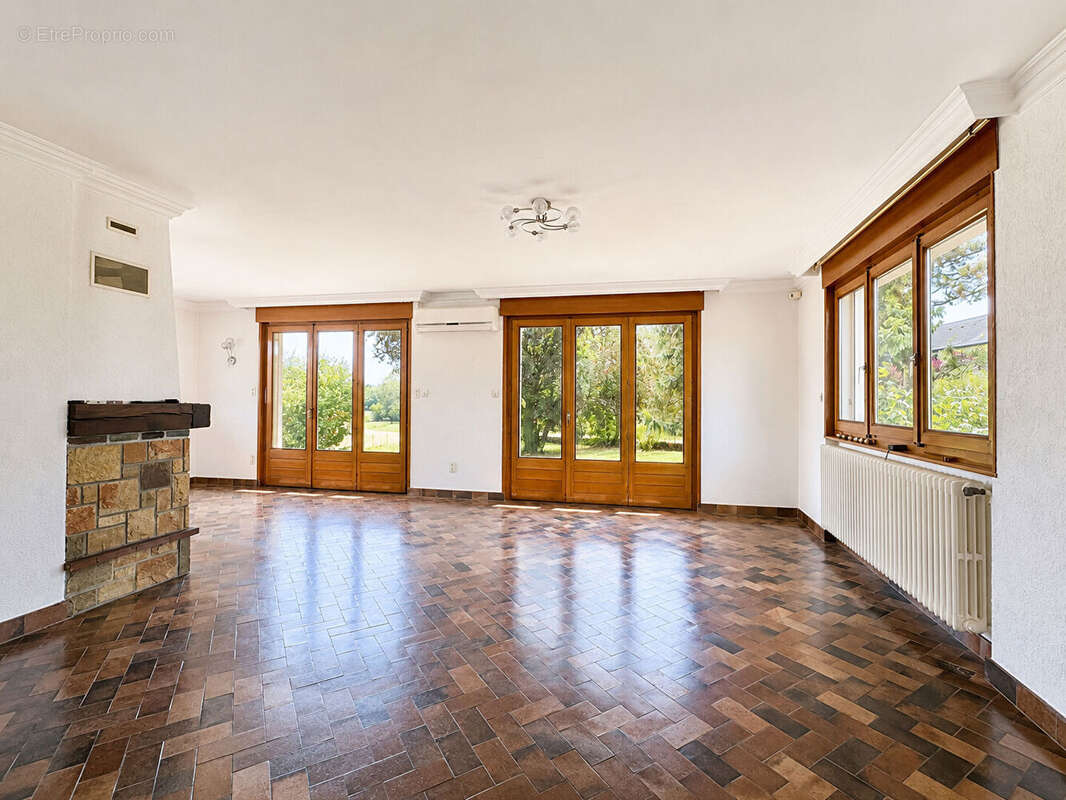 Maison individuelle à vendre 106 m², 3 chambres, sous-sol complet et terrain arboré de 2 000 m² - photo 8