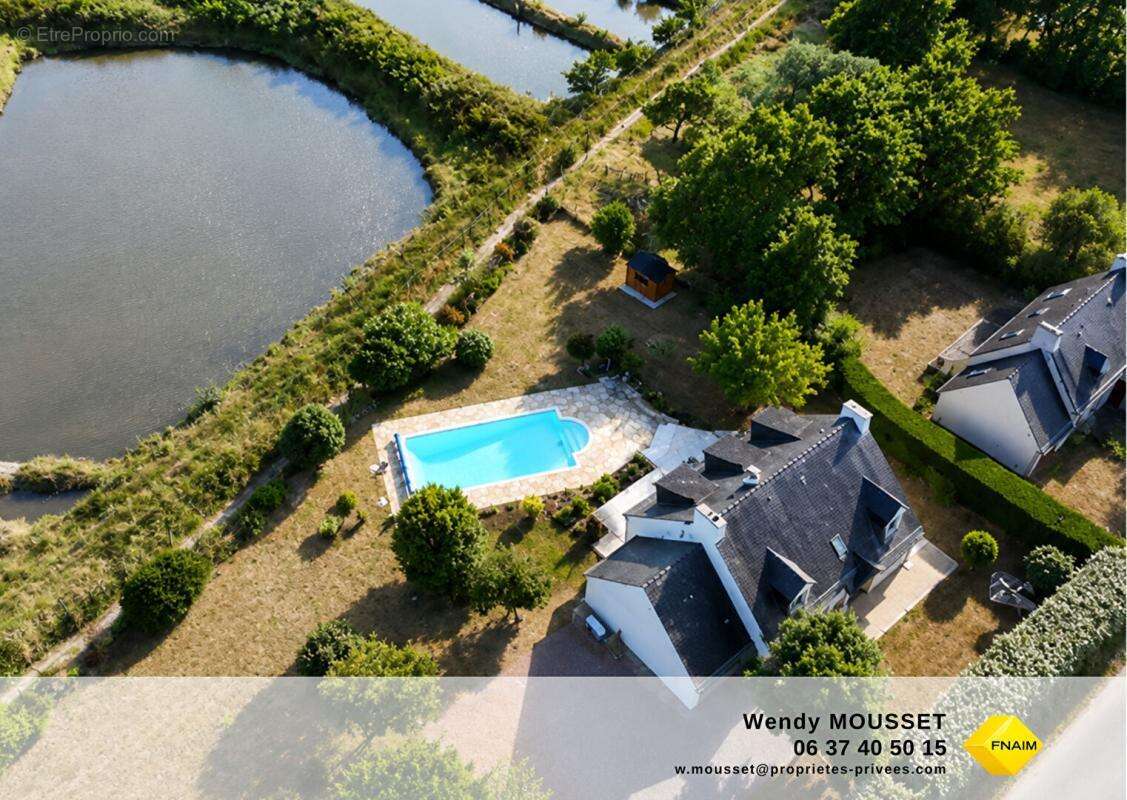 Vue imprenable - Propriété avec piscine et garage à bateau à 5 minutes de la plage - photo 2