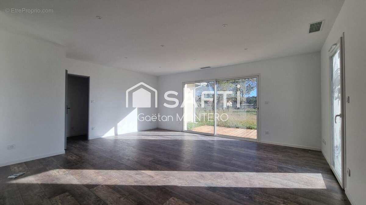 Photo 2 - Maison à SAUGNACQ-ET-MURET