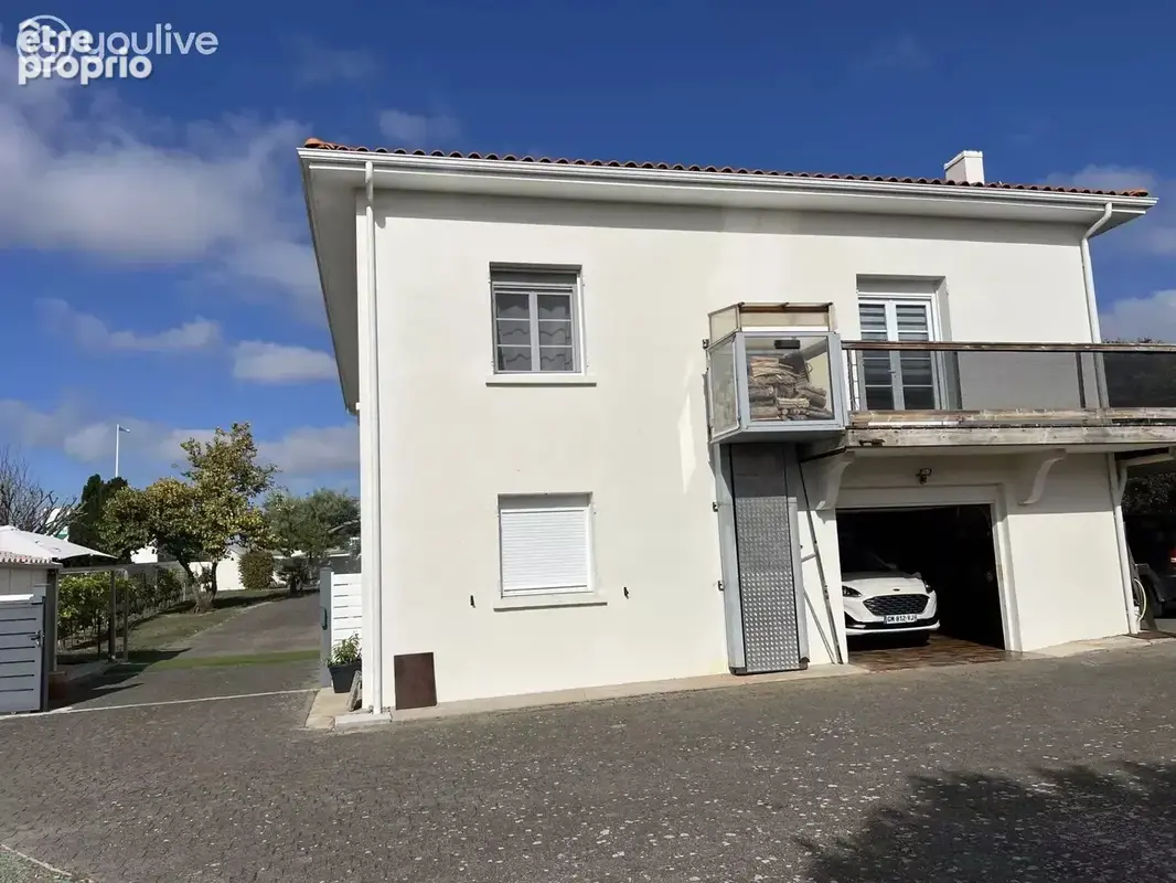 Maison de qualité avec appartement indépendant, terrain arboré de 2 500 m² et ascenseur extérieur - photo 25