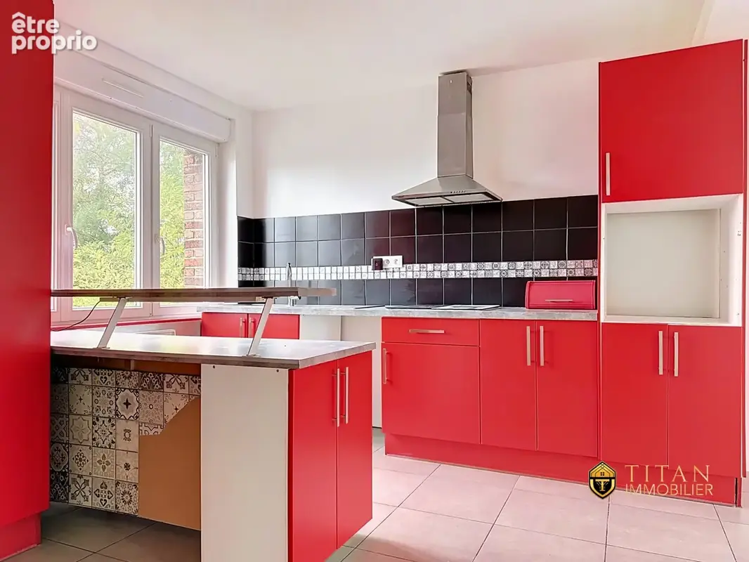 Maison semi individuelle de 60 m² habitables  2 chambres - Jardin  2 garages - Coudekerque-Branche (59210) - TITAN IMMOBILIER