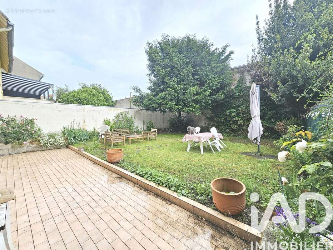 Photo 2 - Maison à LA COURNEUVE