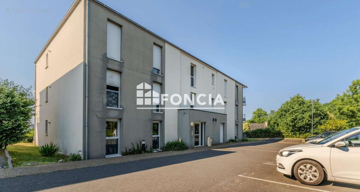 BOHARS - Appartement T4 avec place de parking dans résidence récente - photo 2