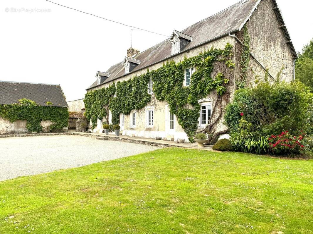 Photo 1 - Maison à DOVILLE