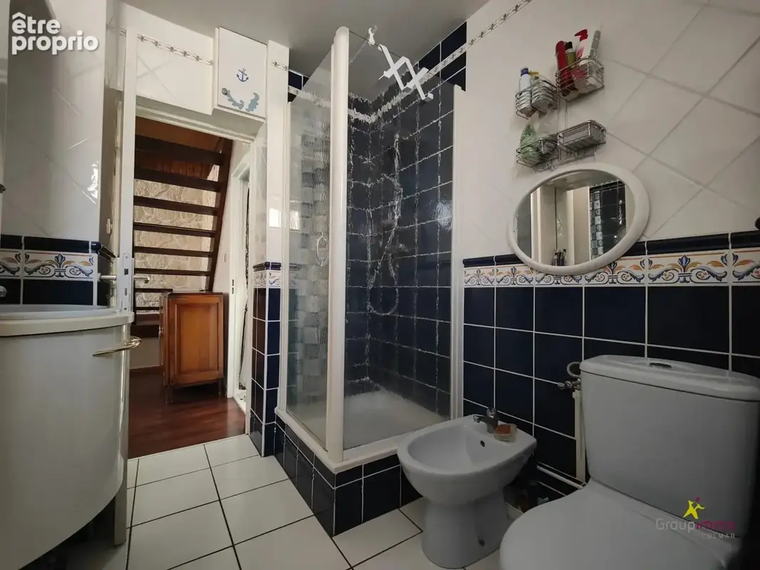 Appartement en duplex avec parking privé - en retrait de la rue - photo 12