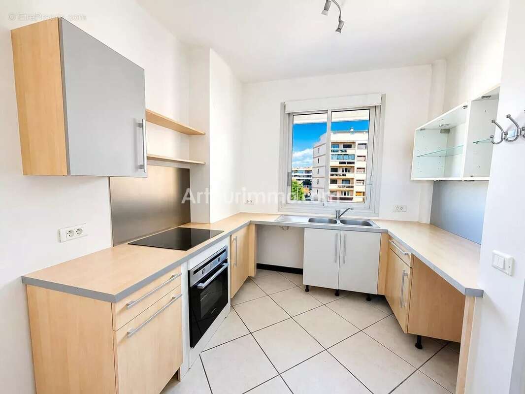 Appartement - centre ville - photo 4