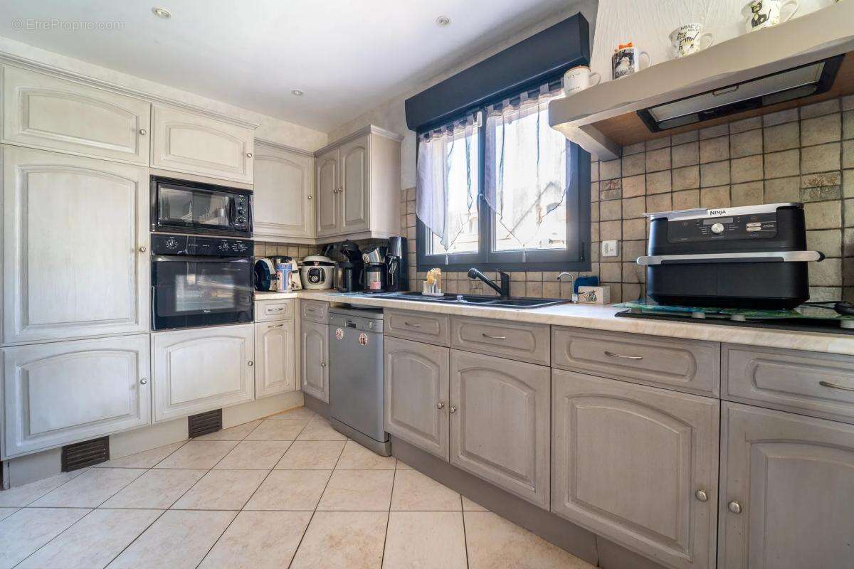 Maison de 5 pièces de 108 m² à Amfreville-sur-Iton - photo 10
