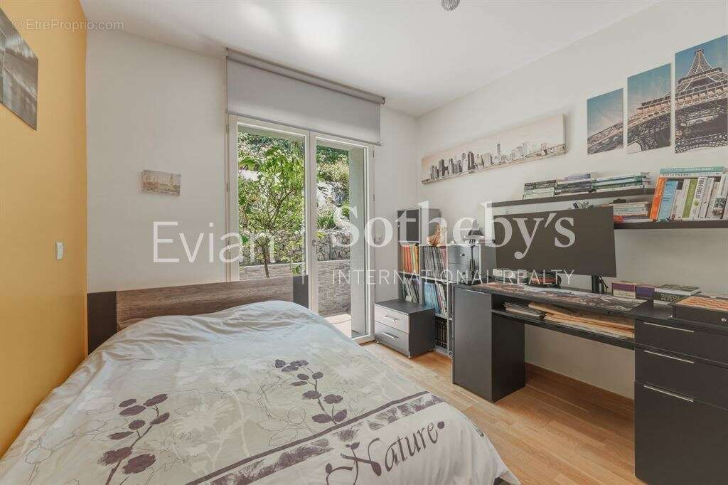 Rare, Evian, T4 en rez de jardin surélevé de 113 m2 avec vue lac et terrasse de 82 m2. - photo 11