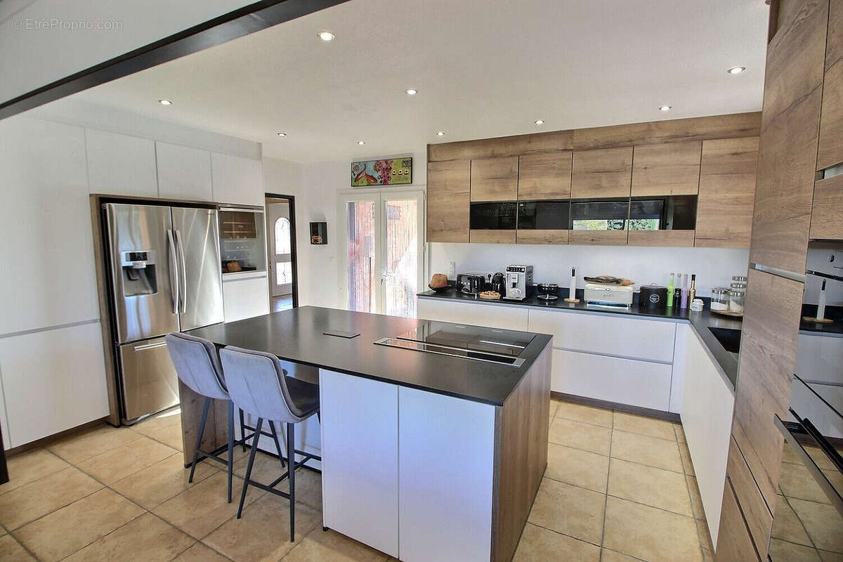 Maison à THEZA