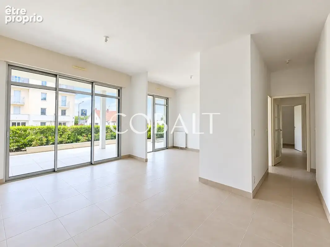 Appartement - 98 m2 - 3 chambres - Rez-de-jardin - double garage - Secteur Bonne Source - photo 1