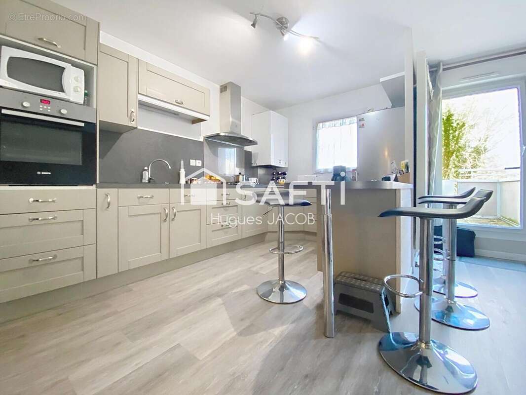 Photo 3 - Appartement à HEROUVILLE-SAINT-CLAIR