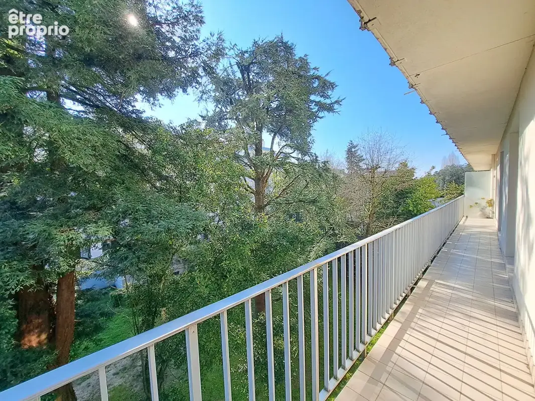 Spacieux appartement T4 de 100,97 m² avec balcon, cave et parking - photo 3
