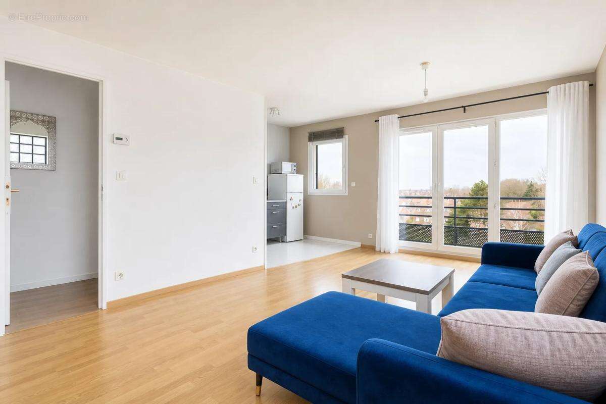 Chaleureux T2 de 42m² avec balcon vendu loué - photo 2