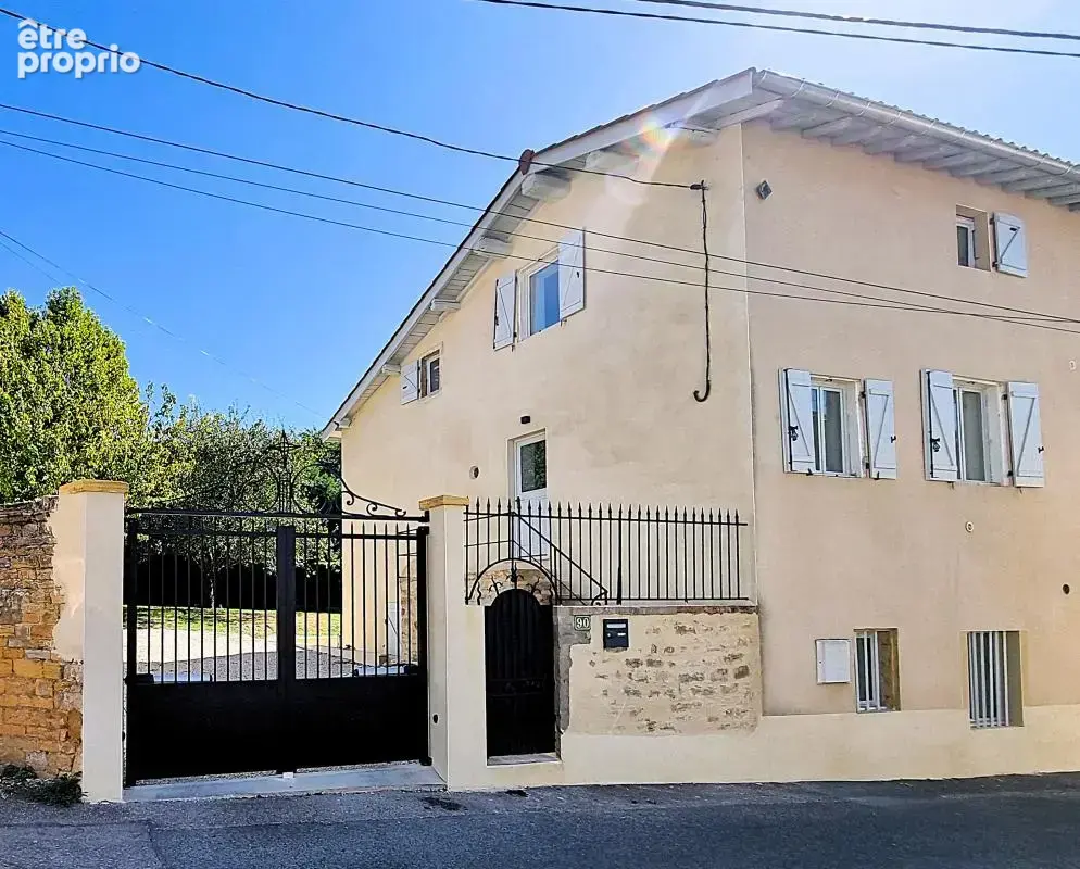 Maison 4 pièces 110 m² à vendre à Fontaines-Saint-Martin (69270) - photo 4