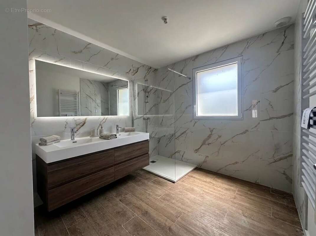 Maison de plain-pied T4 de 98 m² - photo 7