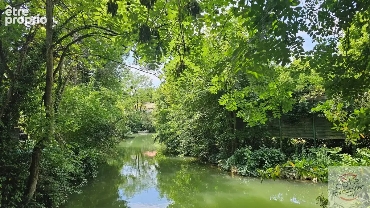 COUP DE COEUR pour cette maison de 131m² sur 2 niveaux, élevée sur un ilot de verdure de 300m² - photo 14