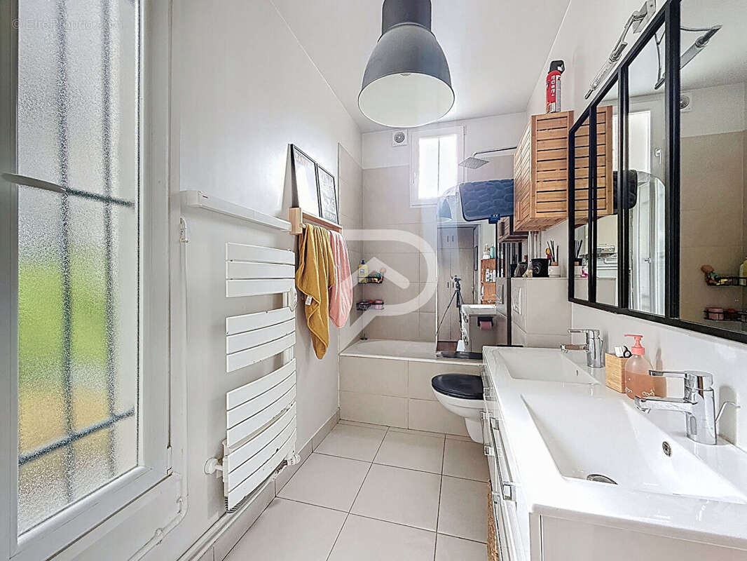 Maison à COURBEVOIE