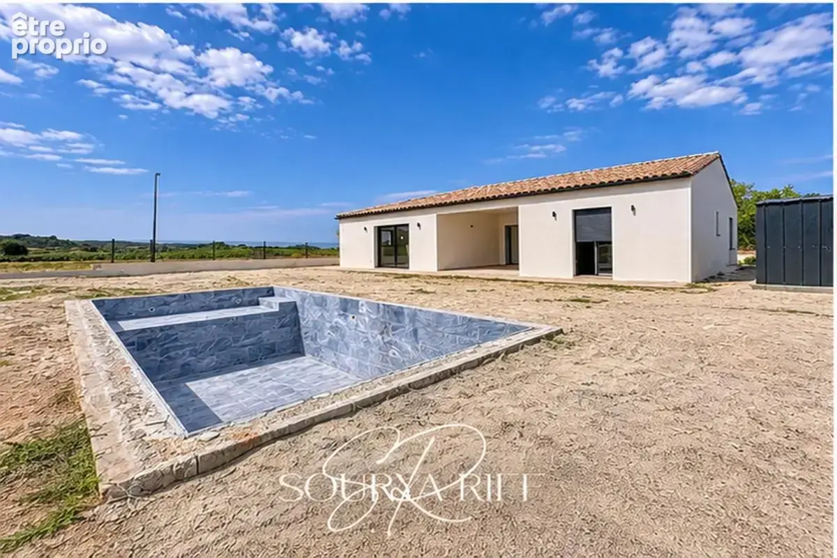 Maison de plain-pied avec climatisation, piscine et garage - photo 2