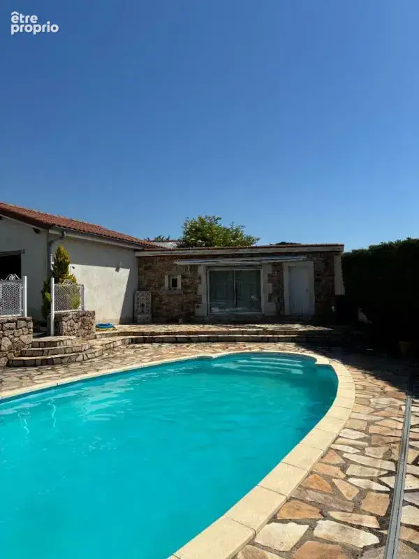 Unieux 42240 maison individuelle des années 70 sur sous sol complet 131m² habitables 4 chambres 3 garages 1 piscine sur 1190m² d - photo 7