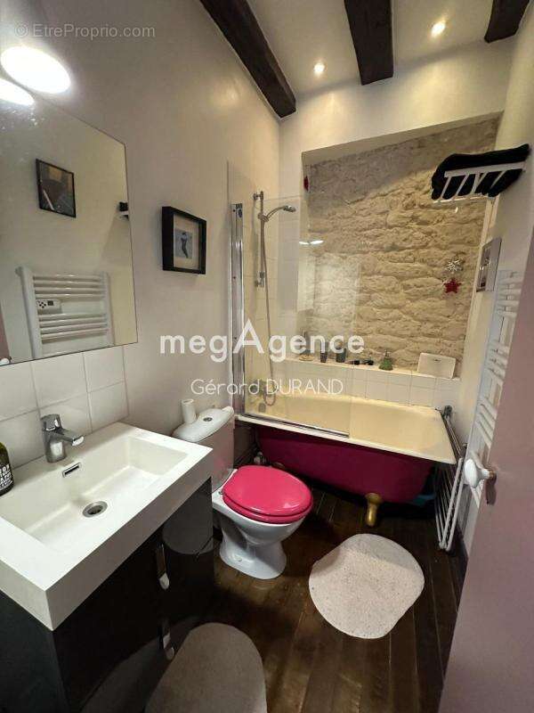Maison authentique en pierres et poutres apparentes contenant 3 appartements - photo 6