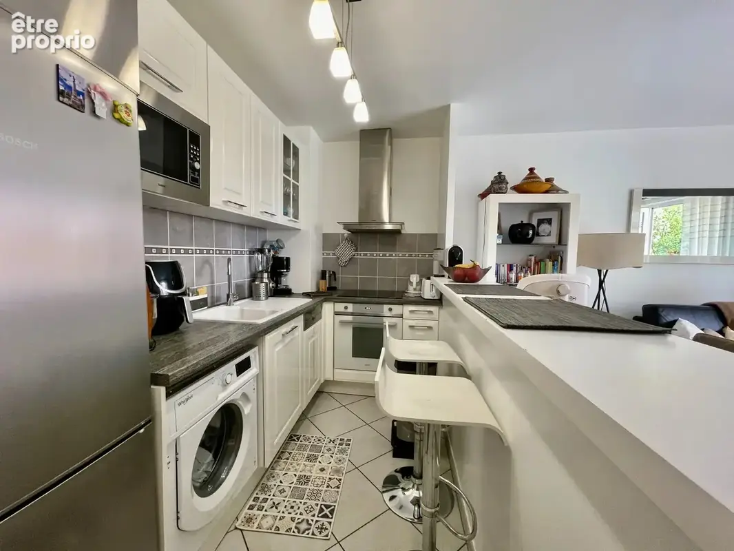 DRANCY - LA MUETTE - F3 de 52m² avec balcon et 2 parkings - proche centre-ville - faibles charges - photo 5