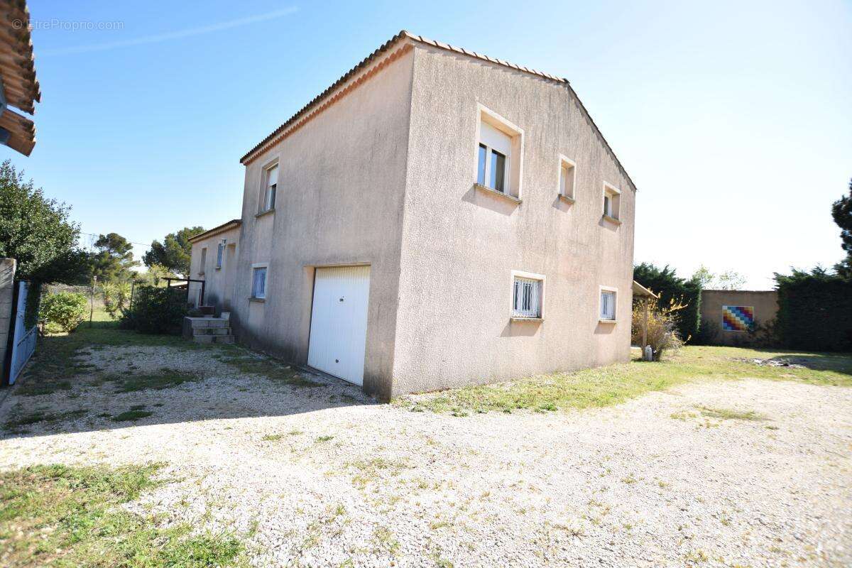 Maison à LAUDUN-L'ARDOISE