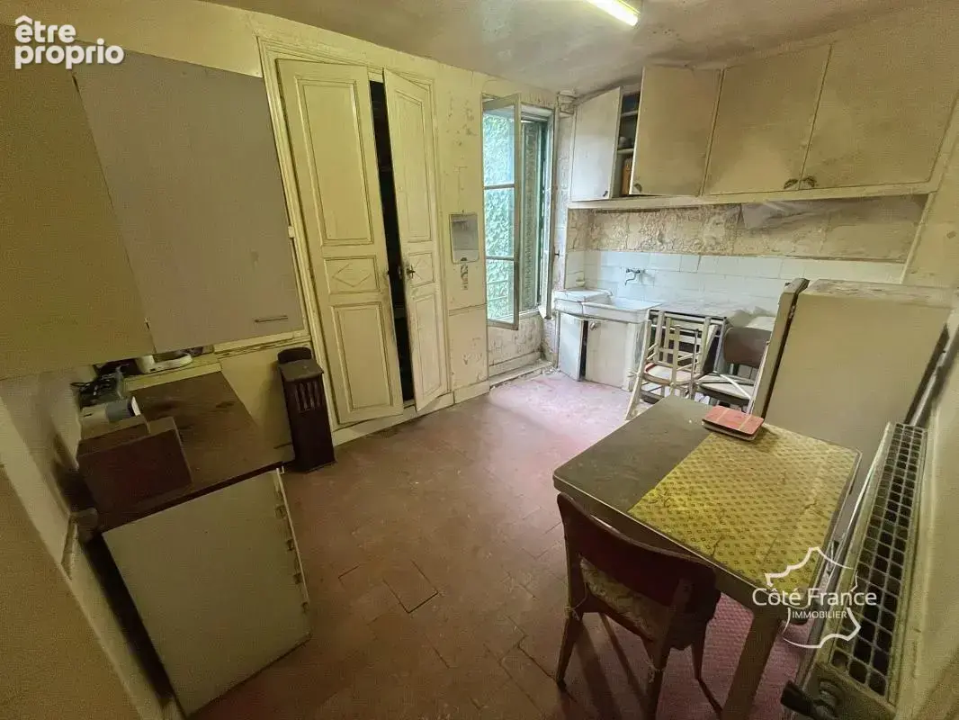 Maison à rénover avec grand garage et un jardin de 100m2 - photo 5