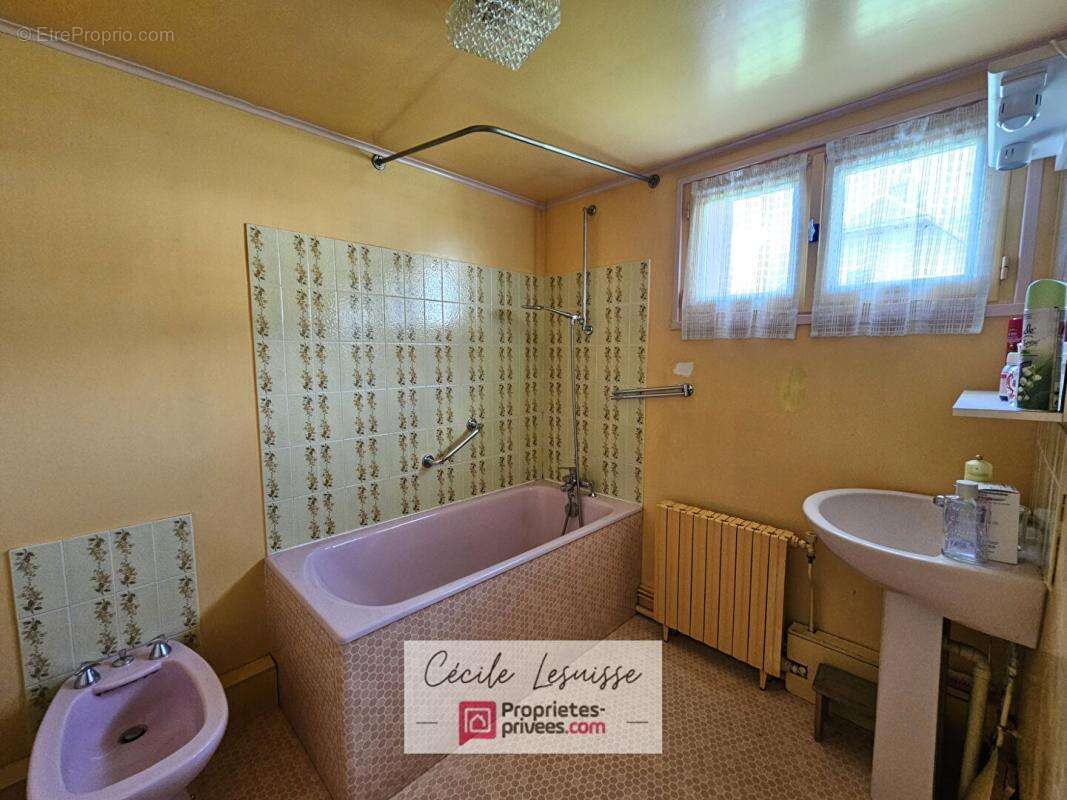 Maison proche du centre-ville avec grand terrain - photo 7