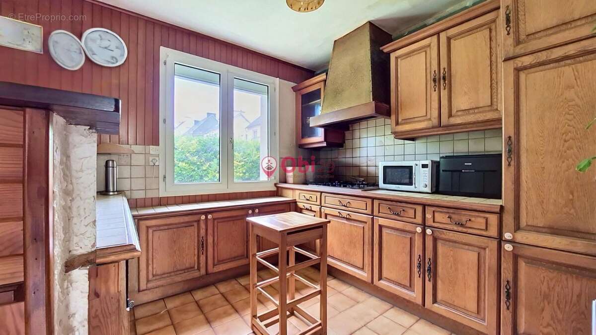 Maison à CHATEAUNEUF-DU-FAOU