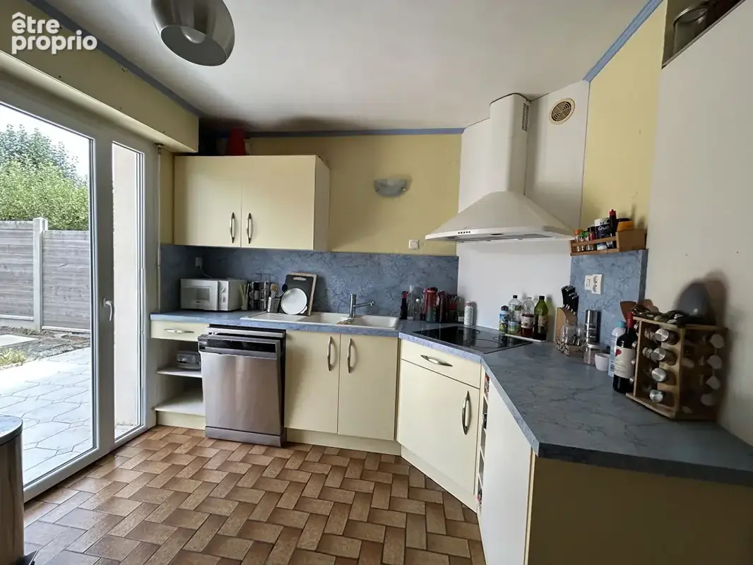 Maison 6 pièces - terrain de 405 m2 - GUILERS - photo 3