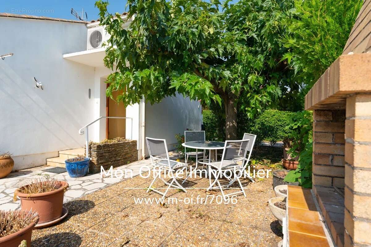 Référence : 7096-NAM - Maison 4 pièces jardin garage - photo 2