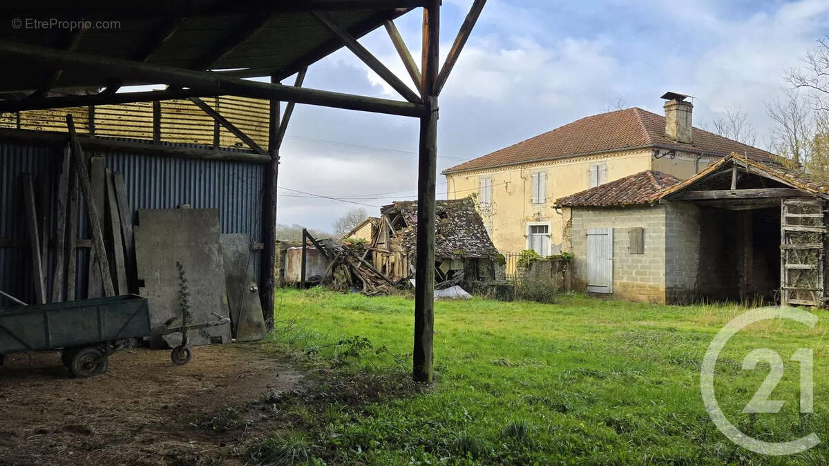 Maison à MOMUY