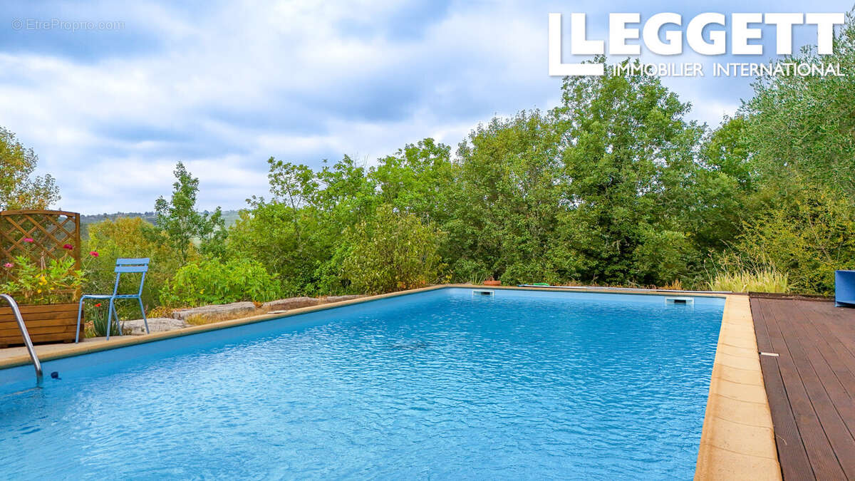 Maison d'architecte avec piscine, 4 chambres, 3 sdb, vue dégagée, au calme, à 10 minutes de Cahors - photo 10