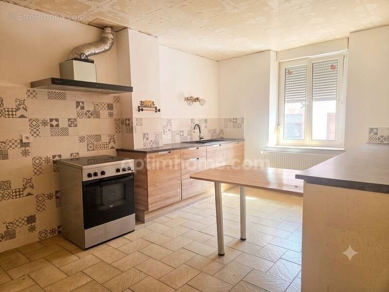 Maison à vendre 3 chambres et jardin à ROMAGNE SOUS MONTFAUCON (55) - photo 2