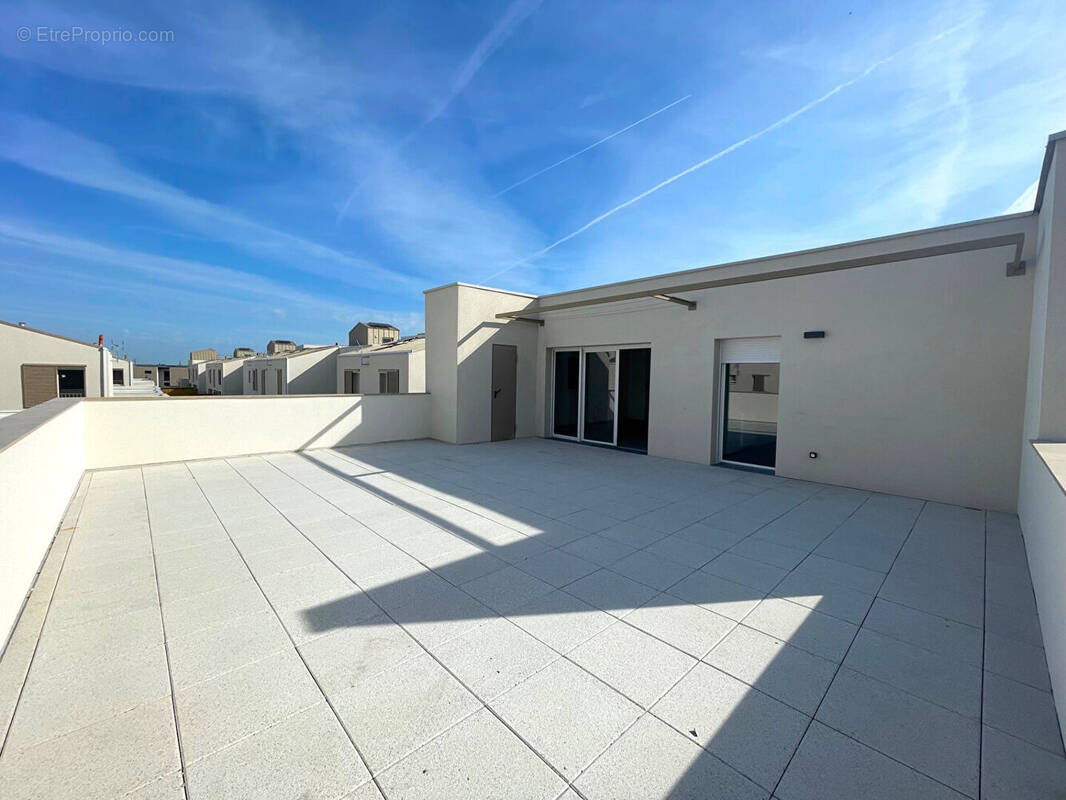 Appartement à BEAUZELLE