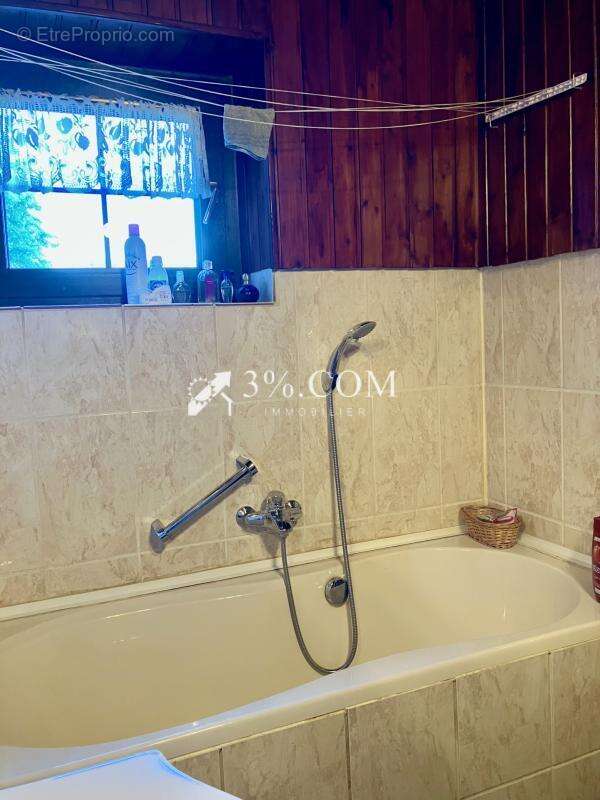 Maison sur les hauteurs avec terrain boisé - photo 10