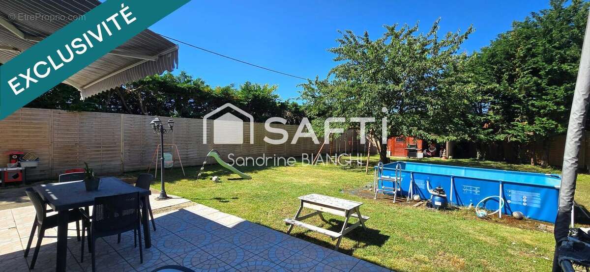 Photo 2 - Maison à CHARVIEU-CHAVAGNEUX