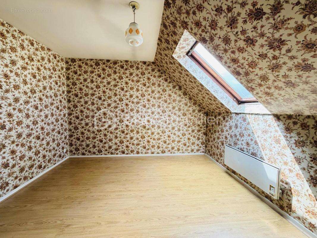 Maison familiale avec 3 chambres et sous-sol complet - photo 5