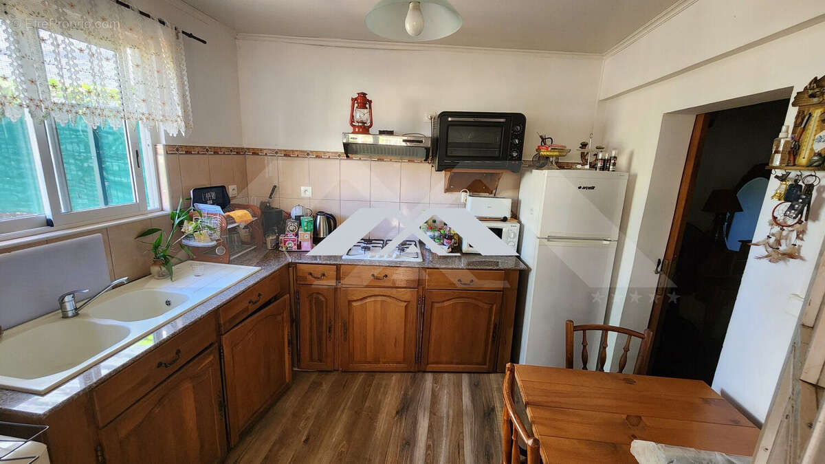 Maison 126 m² à Saint-Joseph  - photo 7