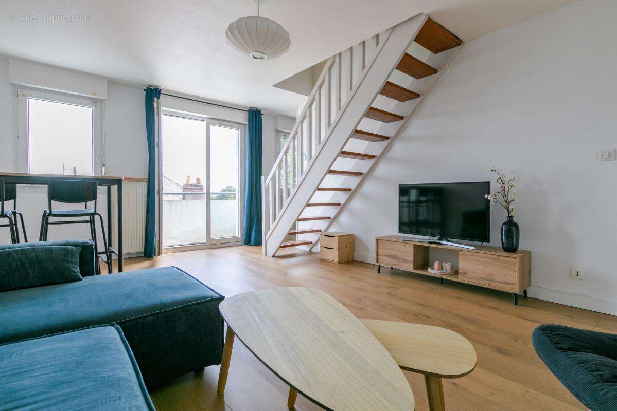 T3 de 72m² en duplex - photo 3