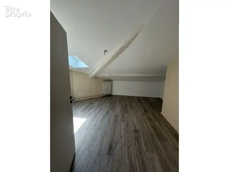 Appartement 4 pièces 85 m² à vendre à Le Chambon-Feugerolles (42500) - photo 4