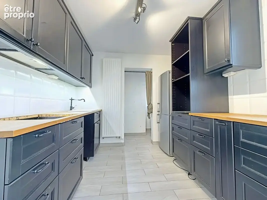 Appartement 5 pièces à vendre à Reims - Secteur Europe, vue sur parc - photo 4