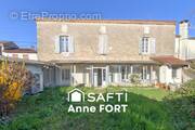 Photo 1 - Maison à LAROQUE-TIMBAUT