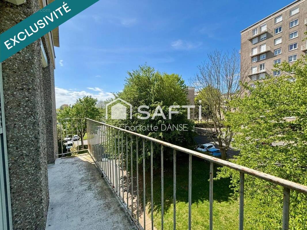 Photo 1 - Appartement à HEROUVILLE-SAINT-CLAIR
