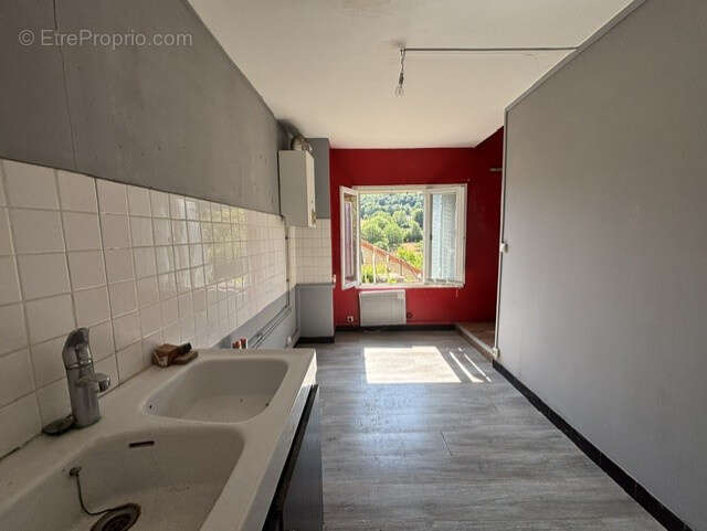 EXCLUSIVITE  à AUTUN,2 apopartements, cave, jardin privatif et greniers. - photo 3